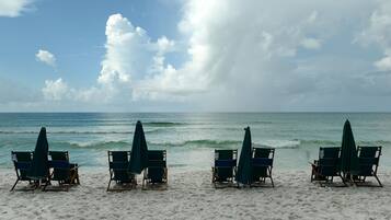 On the beach, sun loungers