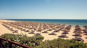 Beach nearby, sun-loungers