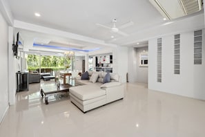 Family Townhome, 5 Bedrooms, Golf View | Living area | 60-inch flat-screen TV with digital channels, TV