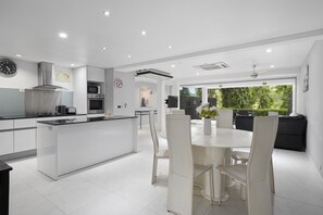 Family Townhome | Living area | 60-inch flat-screen TV with digital channels, TV