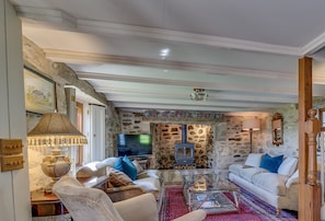 Ground floor: Large characterful sitting room with wood burning stove - Tregadjack Farmhouse, Tregathenan, Near Porthlevan , Cornwall (Helston)