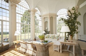 Ground floor:  The beautiful, three bay glazed orangery with stunning views over the parkland