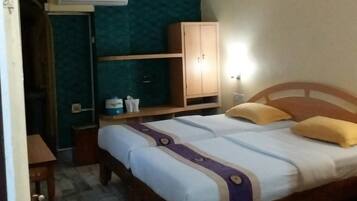 Desk, rollaway beds, free wired Internet, bed sheets