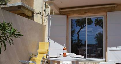 Cozy 2-Bedroom Apt in Saint Pierre La Mer, Steps from Beach, Terrace with BBQ
