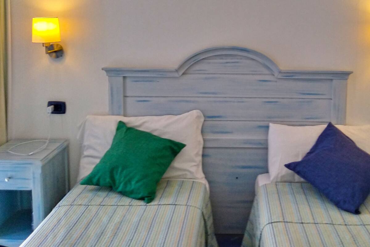 Double or Twin Room, Sea View | Minibar, in-room safe, desk, blackout curtains