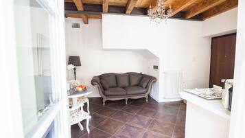 Deluxe Apartment, Balcony | Living area | Flat-screen TV