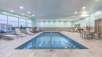 Indoor pool, open 7 AM to 11 PM, sun loungers