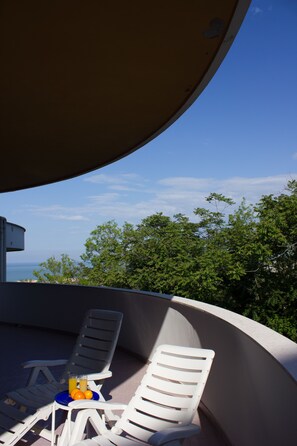 Junior Suite, Balcony | Minibar, in-room safe, desk, iron/ironing board