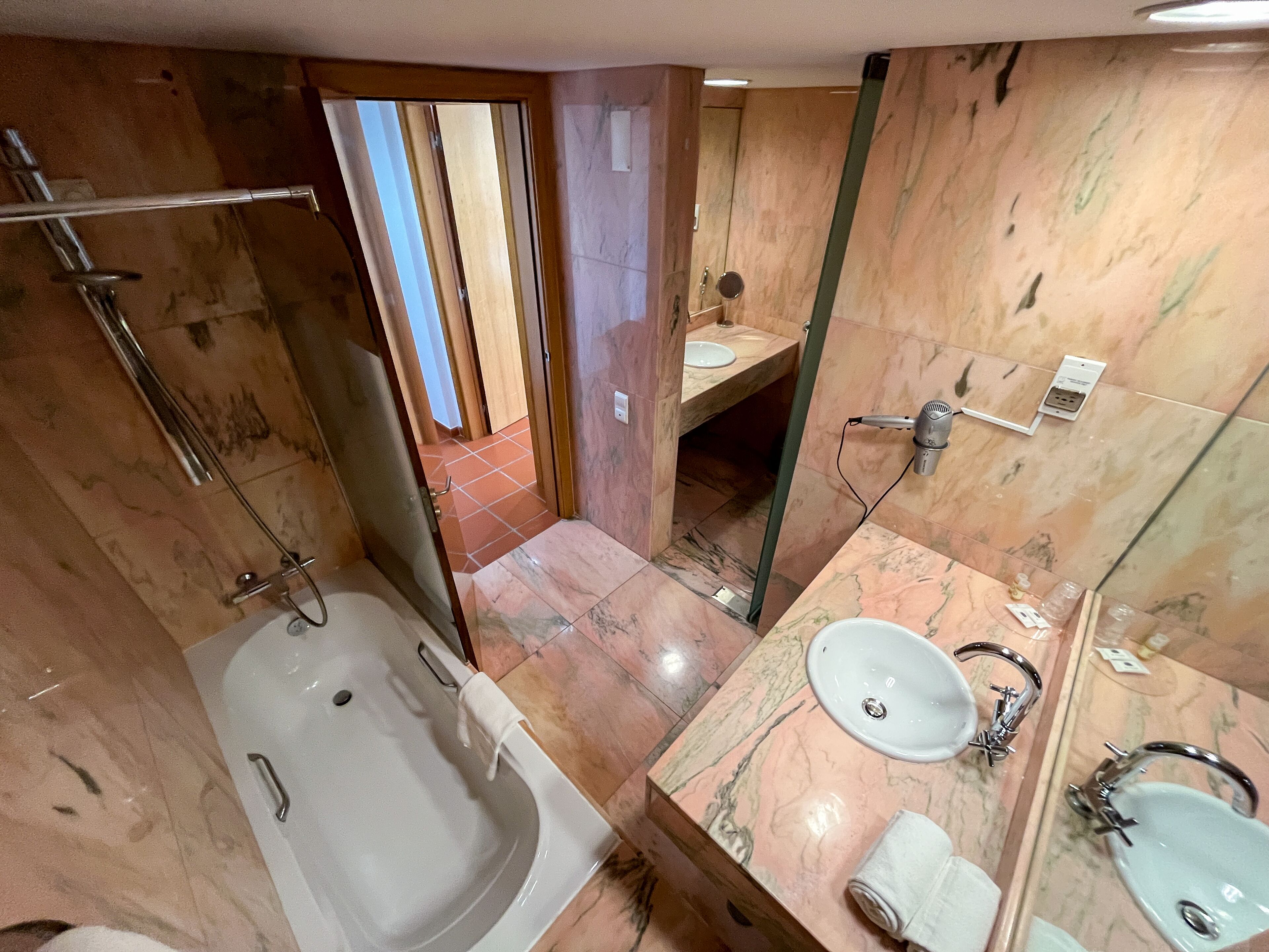 deep-soaking bathtub, bidet, towels