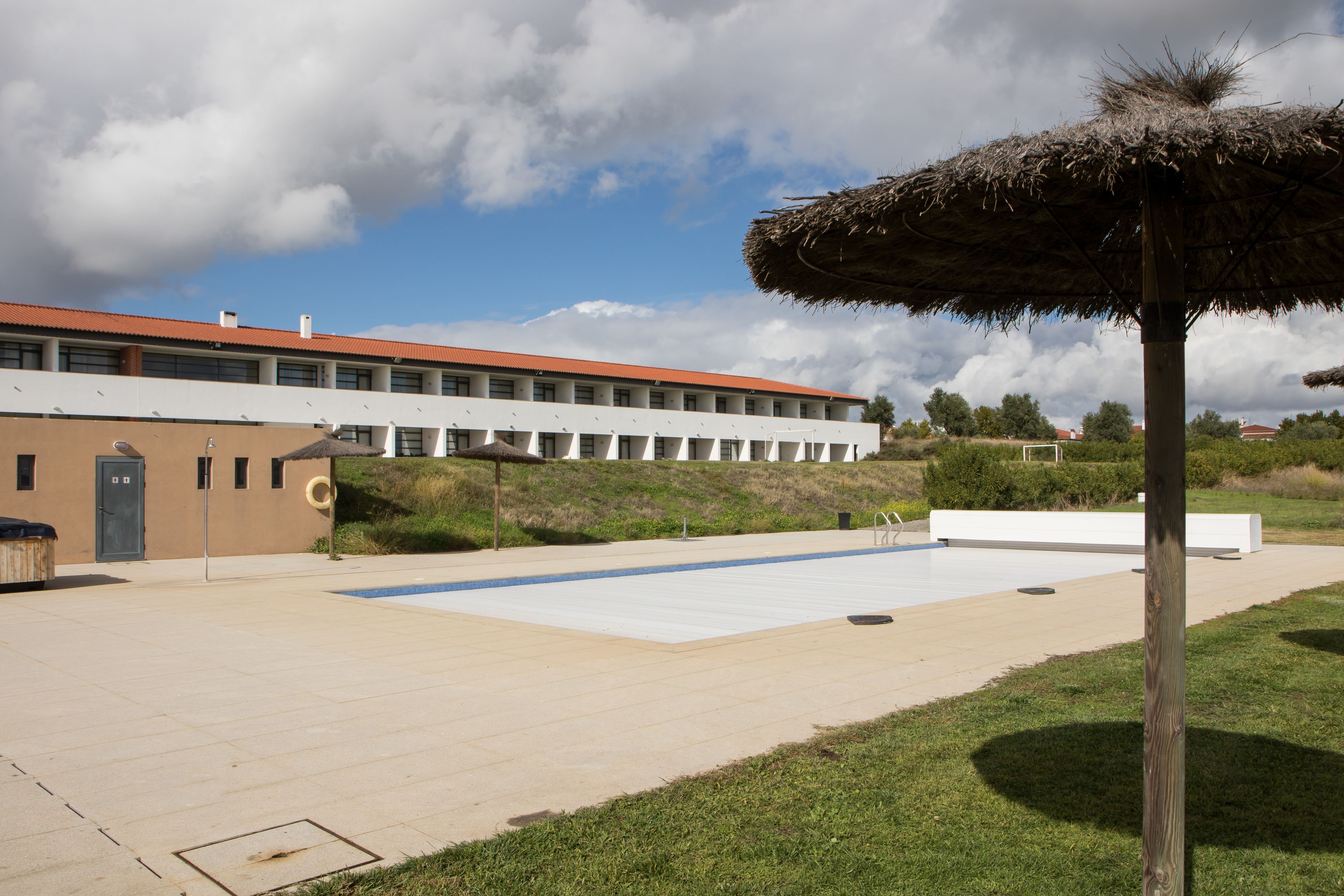 Seasonal outdoor pool, pool umbrellas