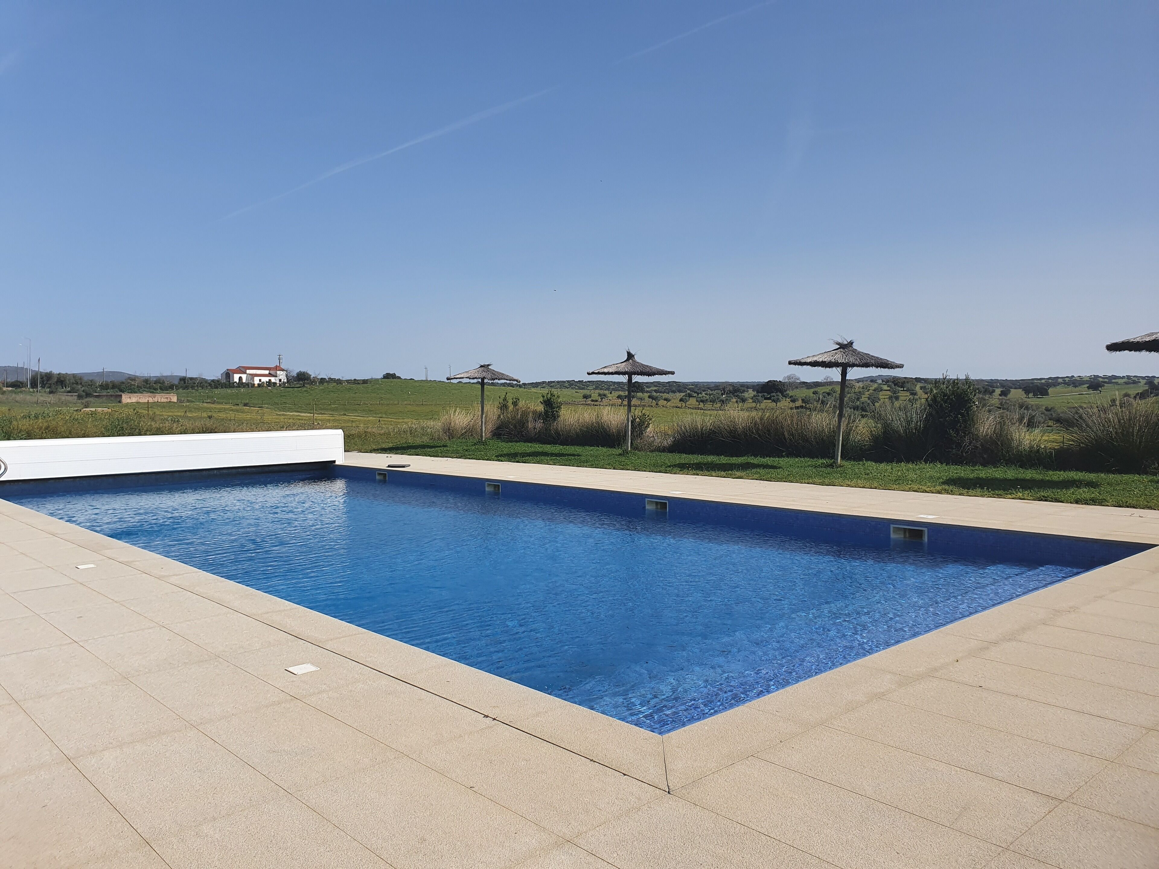 seasonal outdoor pool, pool umbrellas