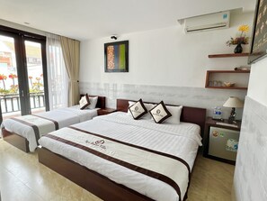 ห้องเบสิกทริปเปิล | มินิบาร์, โต๊ะทำงาน, ผ้าม่านกันแสง, Wi-Fi ฟรี