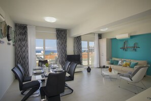 Apartment, 1 Bedroom (communal pool) | Living room | Flat-screen TV - Protaras Marianna Suite (Paralimni)
