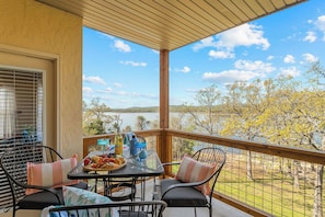 Outdoor dining - Spacious Lake Front Condo, Sunsets, 5 min to SDC (Branson)