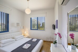 Apartment, 2 Bedrooms, Pool Access, Pool View | 2 bedrooms, iron/ironing board, cribs/infant beds, free WiFi