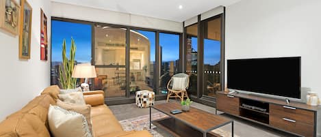 Executive Apartment, 2 Bedrooms, River View | Living area | 55-inch LED TV with cable channels, TV, pay films