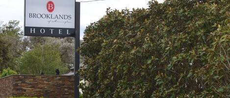 A sign for Brooklands Hotel Reception.