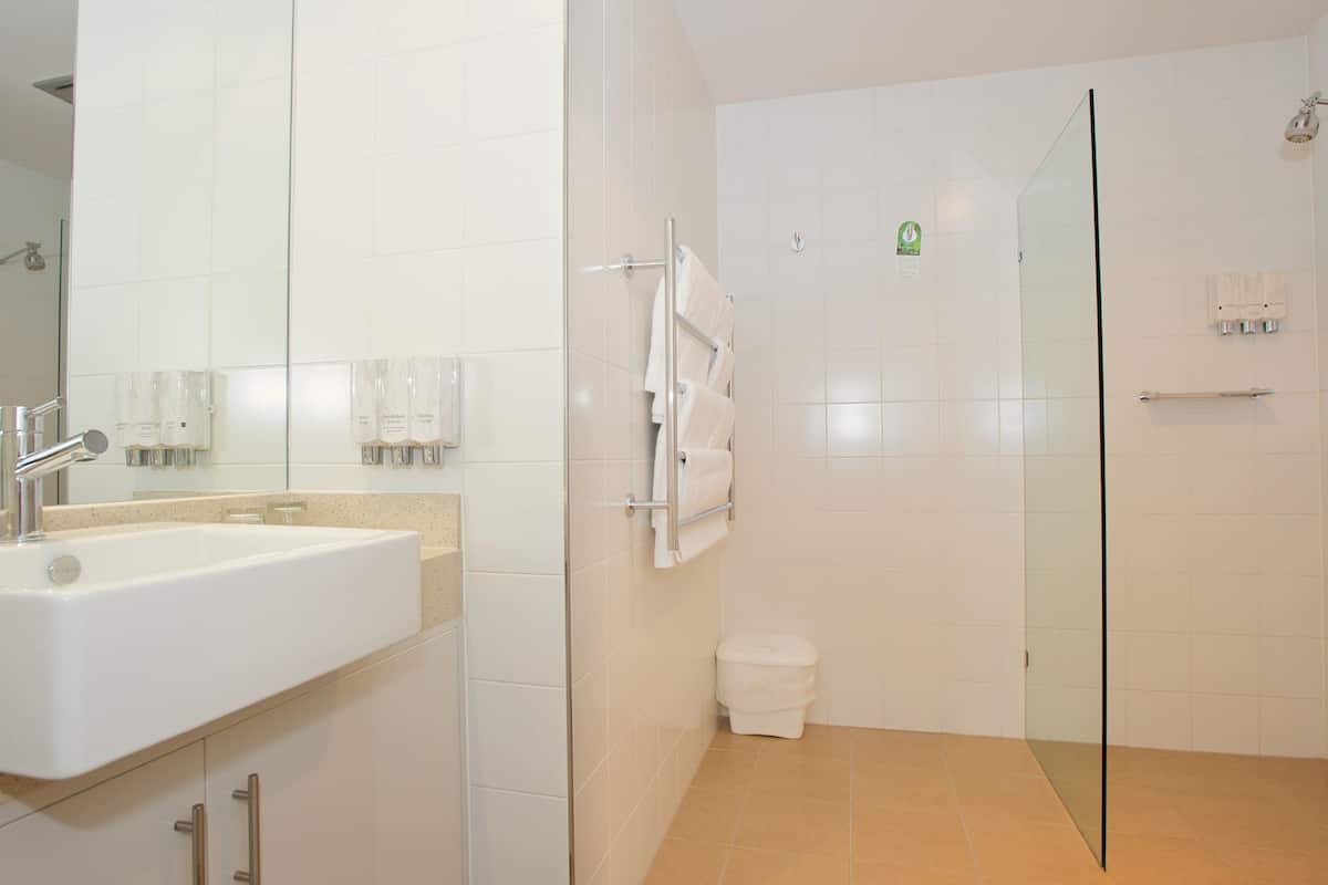 studio room | bathroom | shower, free toiletries, hair dryer, towels