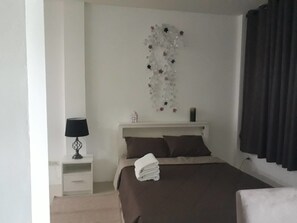 1-Bedroom Apartment | Premium bedding, individually decorated, individually furnished, desk