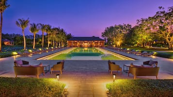 Outdoor pool, open 6 AM to 9 PM, pool loungers