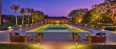 Outdoor pool, open 6 AM to 9 PM, pool loungers