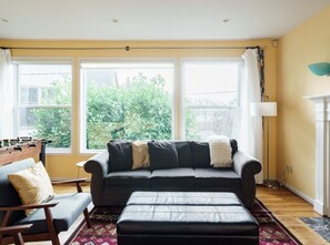 Smart TV, fireplace, table football, books