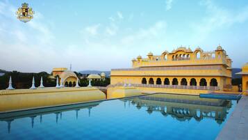 Outdoor pool, pool umbrellas, pool loungers