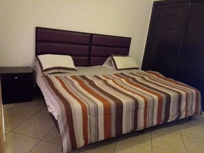 Standard Apartment, 2 Bedrooms | 1 bedroom, desk - Trevi Towers (Accra)