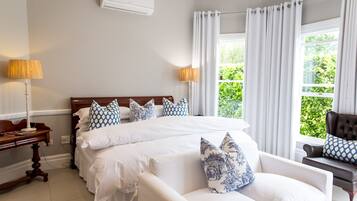 Family Room, 2 Bedrooms | Minibar, individually decorated, free WiFi, bed sheets