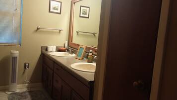 Combined shower/tub, hair dryer, towels, soap