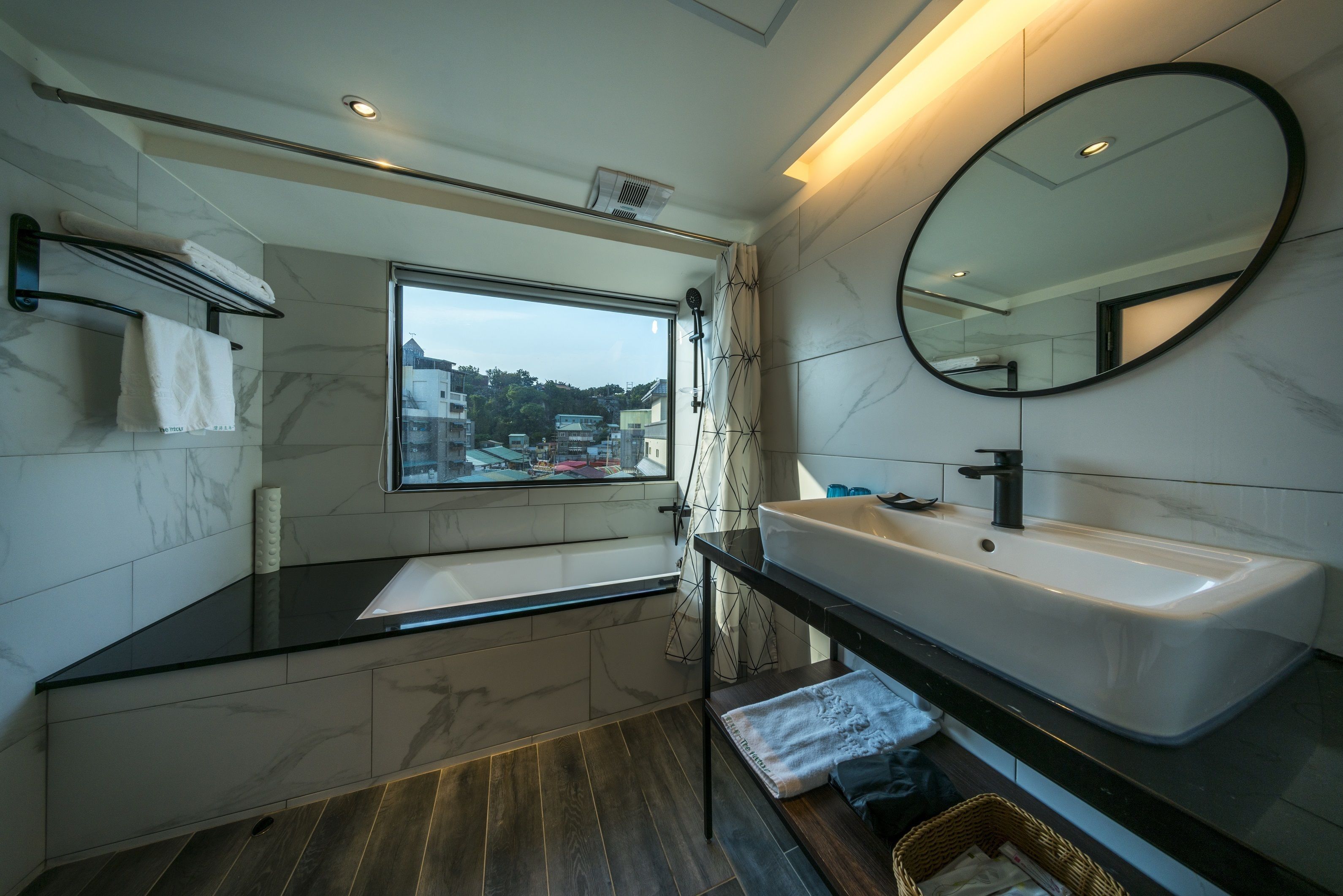 superior double room | bathroom | bathtub, hair dryer, towels, soap