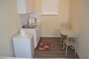 Fridge, microwave, oven, cookware/dishes/utensils