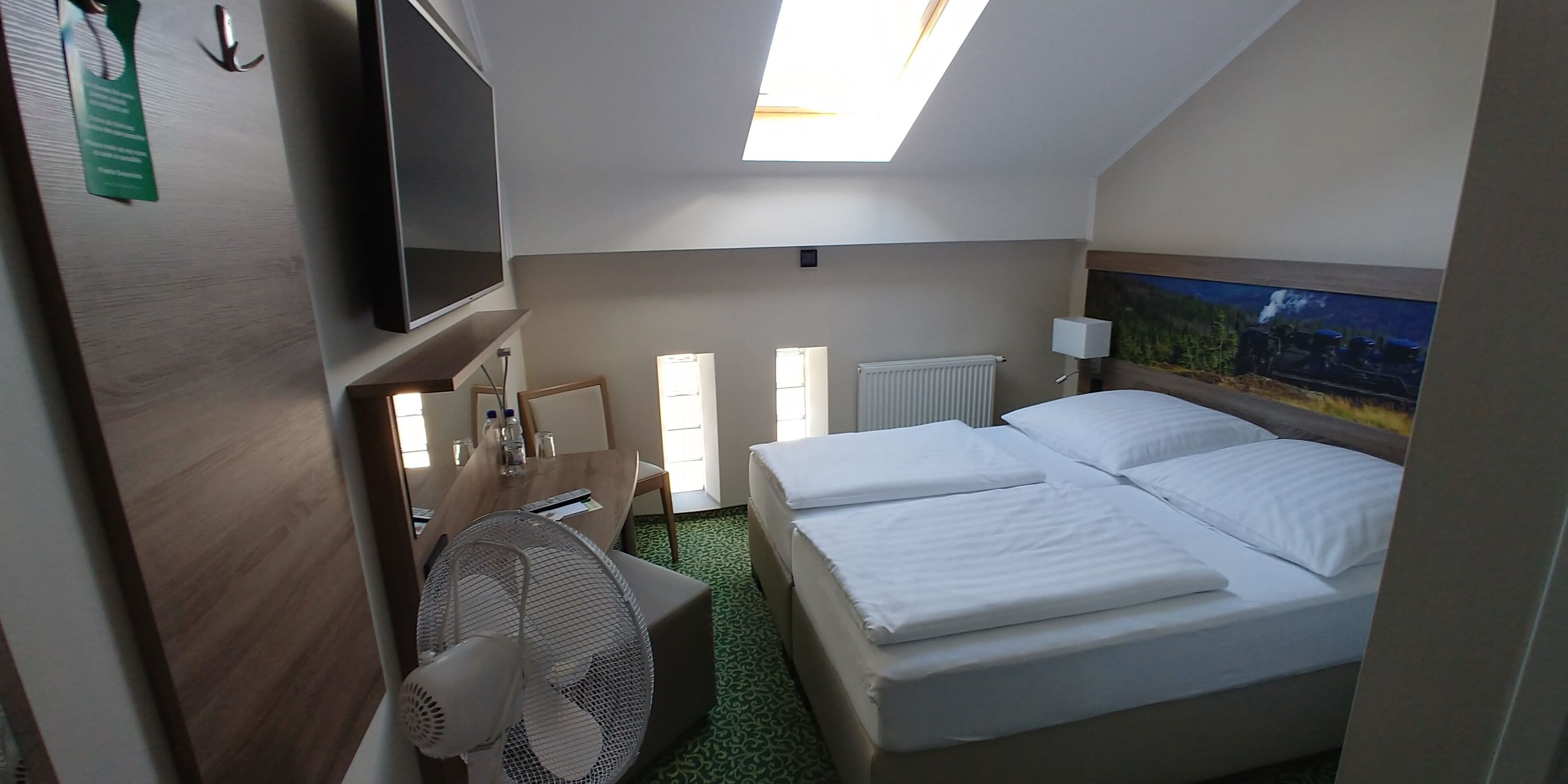 economy double room | premium bedding, down duvets, in-room safe, desk