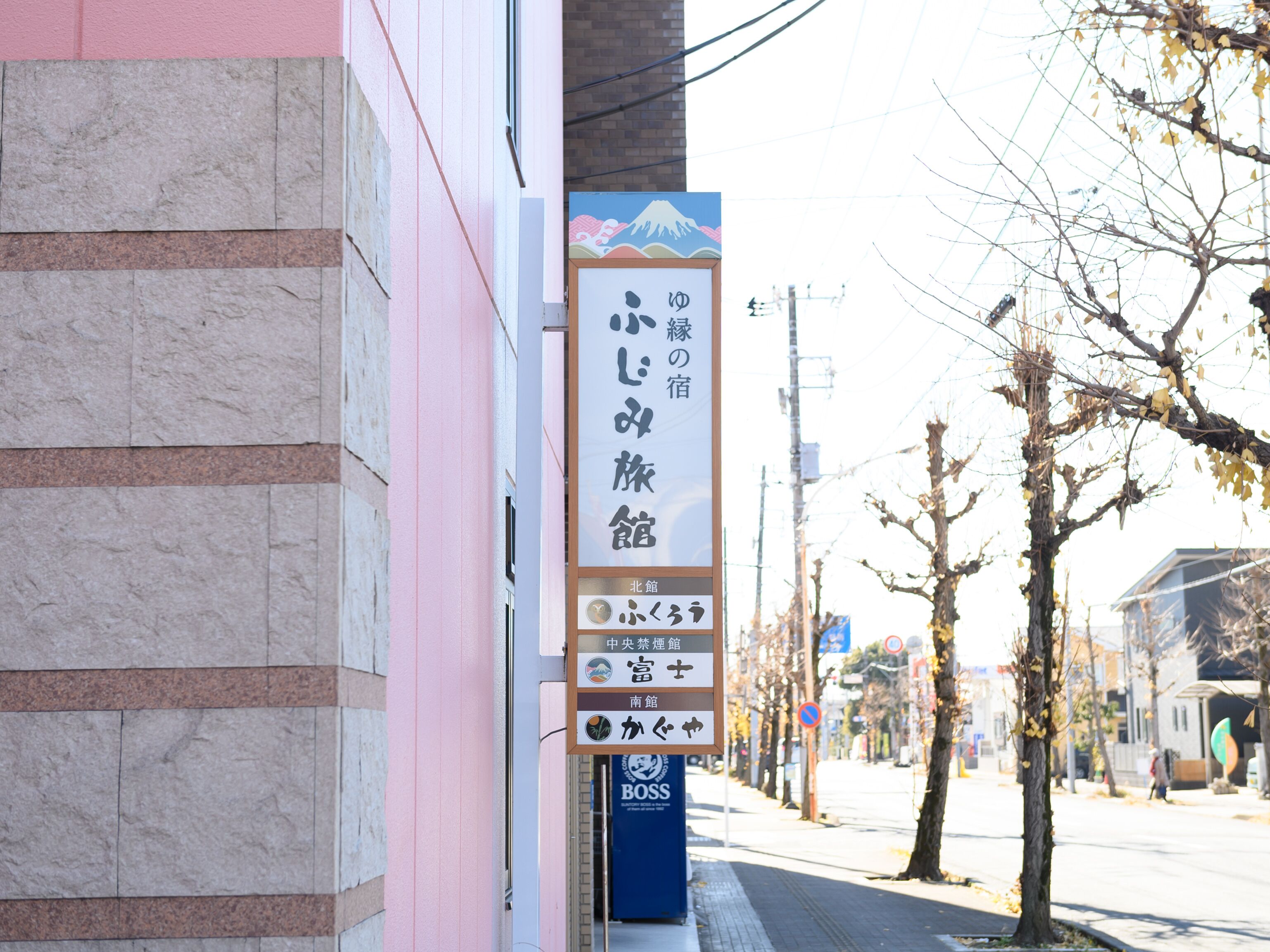 A building with a sign indicating a hotel.
