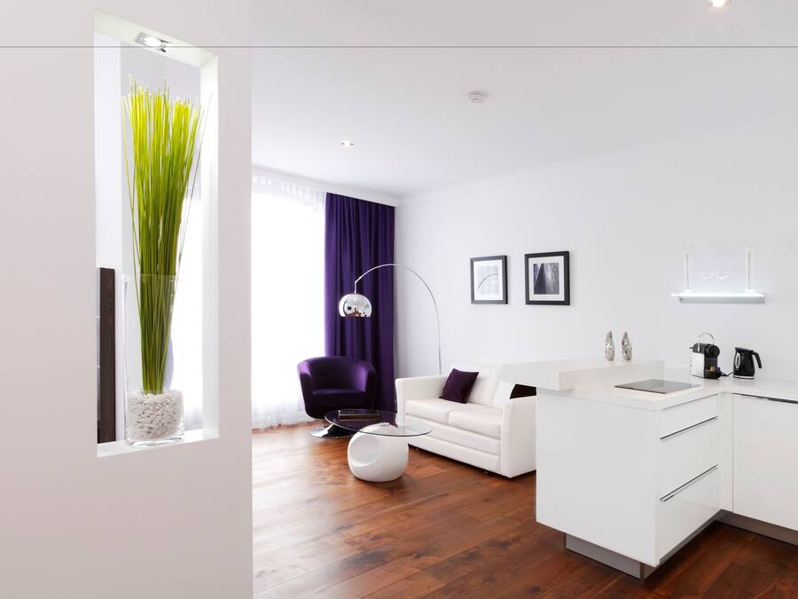 Junior Suite | Living area | 46-inch flat-screen TV with satellite channels, TV