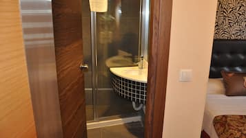 Shower, free toiletries, hair dryer, slippers