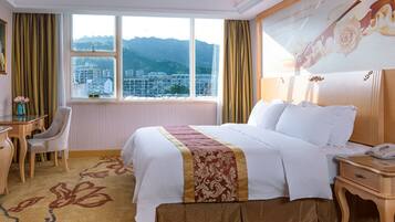 Deluxe Double or Twin Room A | Minibar, in-room safe, desk, blackout drapes