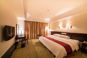 Camera Deluxe con letto matrimoniale o 2 letti singoli | Una cassaforte in camera, una scrivania, tende oscuranti