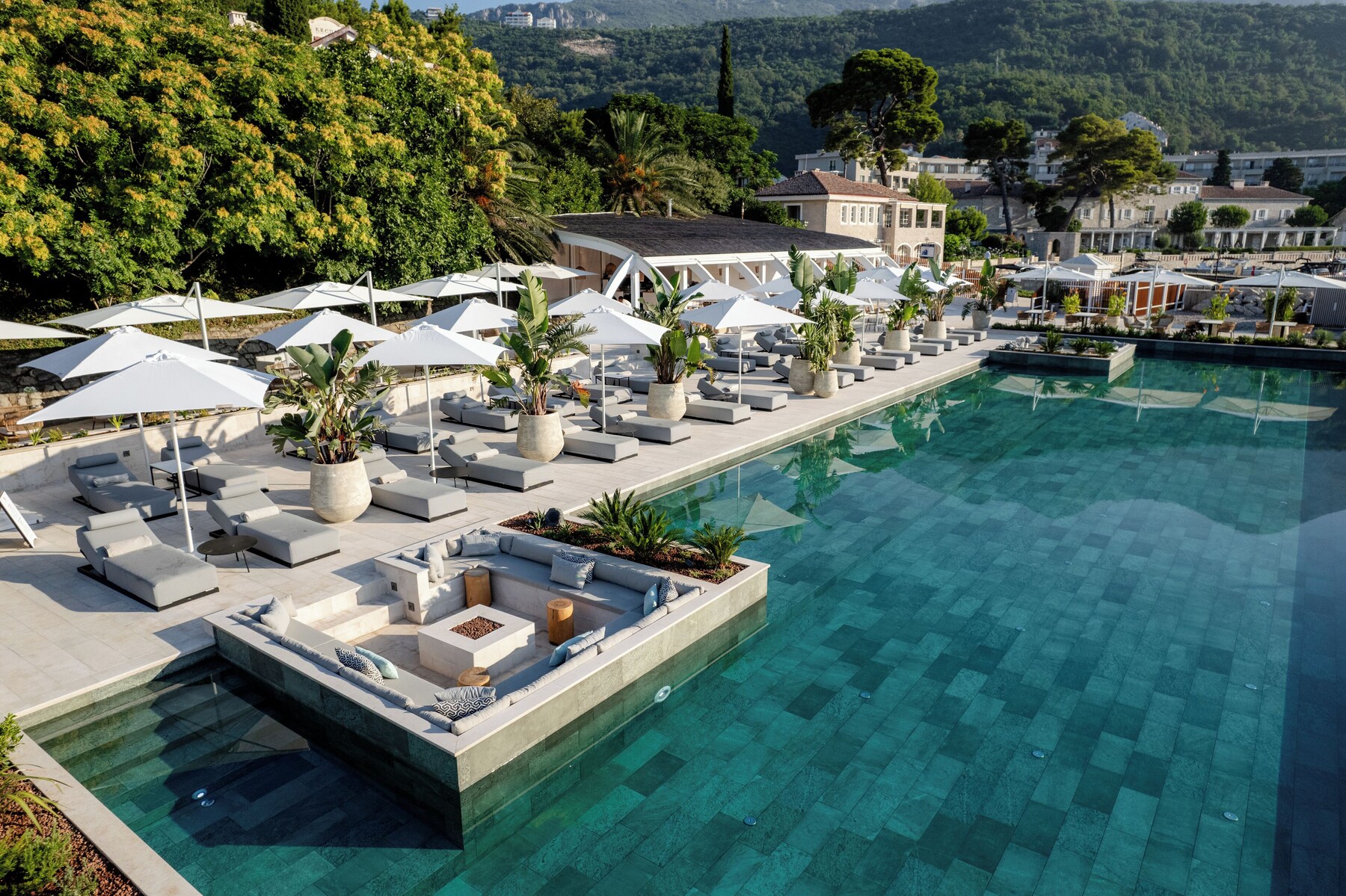 Private beach, black sand, sun-loungers, beach umbrellas