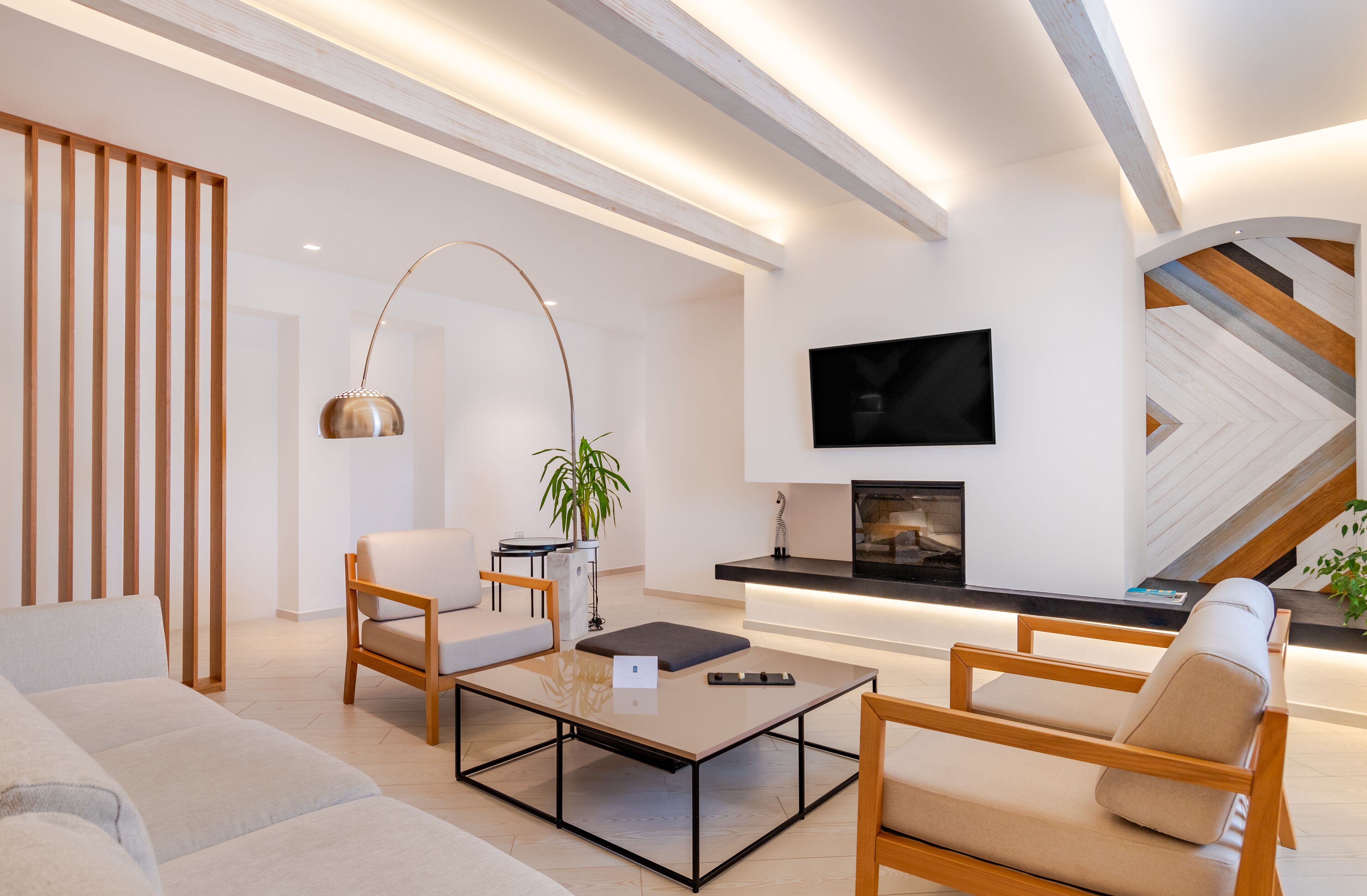 king suite with sea view in historical building | living area | 55-inch smart tv with satellite channels, tv