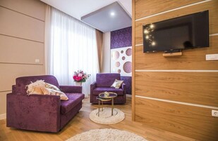 Deluxe Süit (VIP 1) | Oturma odası | Akıllı televizyon 