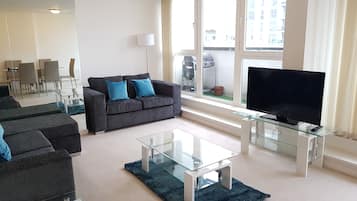 Premium Apartment, 2 Bedrooms, River View, Executive Level | Living room | 43-inch flat-screen TV with cable channels, TV