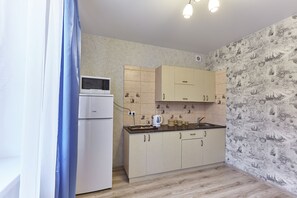 Superior Apartment | Private kitchen | Fridge, microwave, stovetop, coffee/tea maker - Apartments City Krasnodar (Krasnodar)