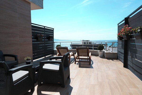 Deluxe Suite, Terrace, Sea View | Balcony view