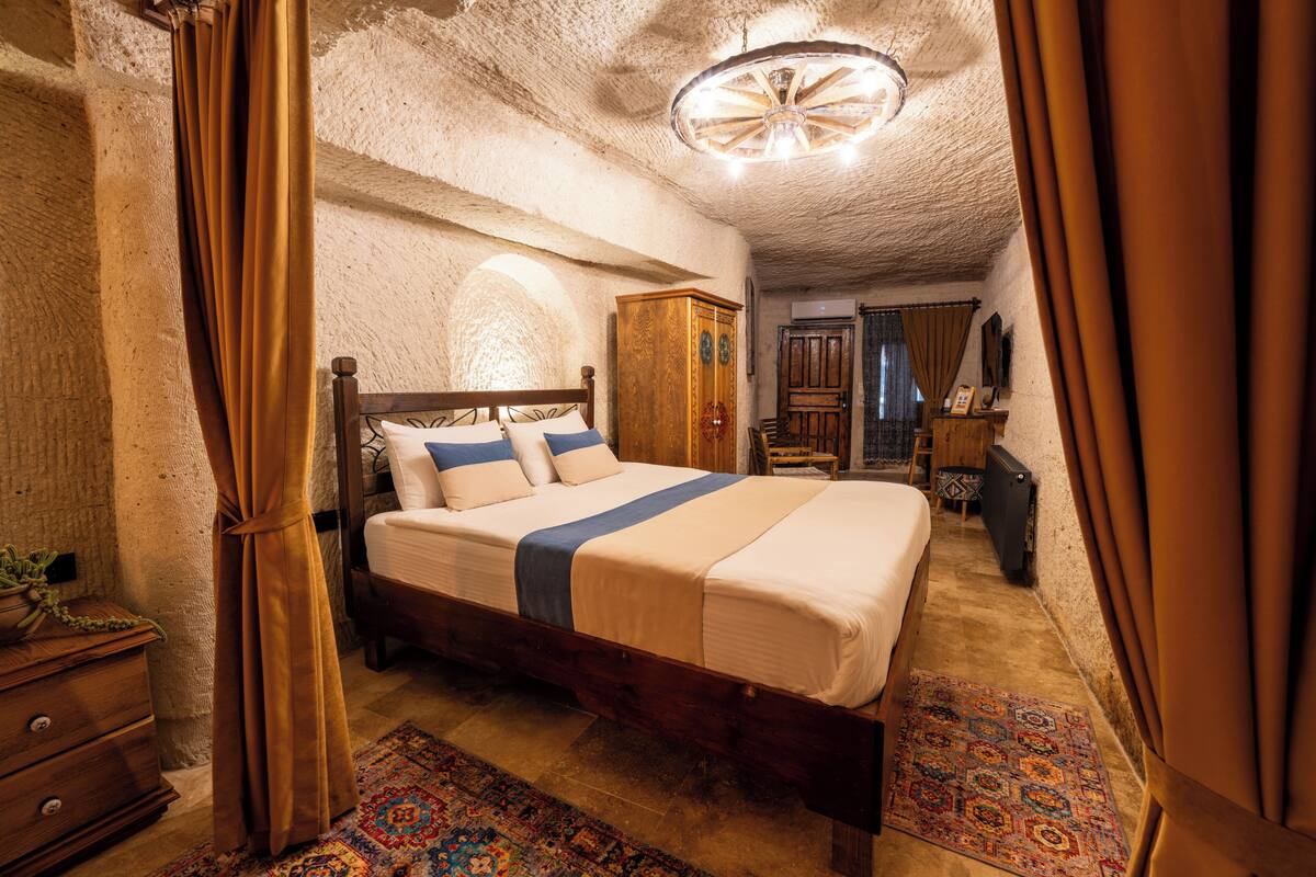 Family Cave Suites | 1 chambre, draps en coton égyptien, literie de qualité supérieure