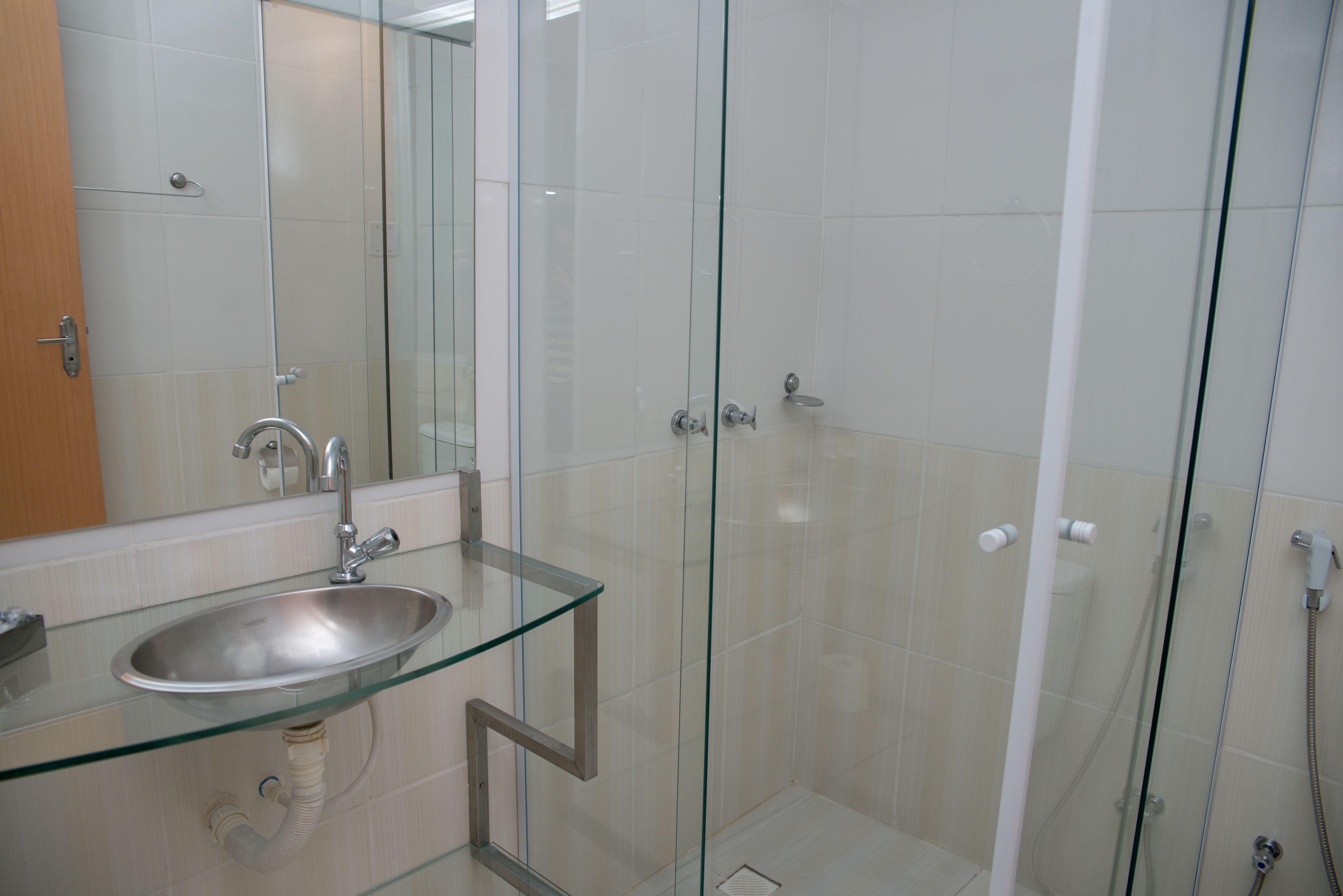 deluxe room | bathroom | shower, free toiletries, hair dryer