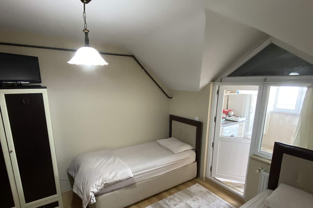 Chambre Double ou avec lits jumeaux, 1 chambre, terrasse | 1 chambre, fer et planche à repasser, Wi-Fi gratuit