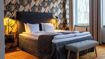 Habitación superior | Ropa de cama de alta calidad y cortinas blackout