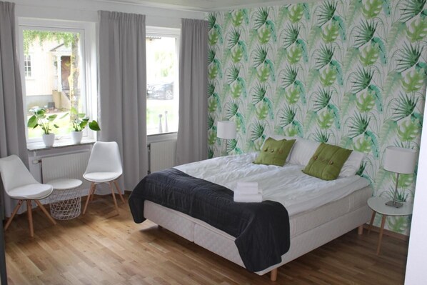 Premium bedding, blackout drapes, iron/ironing board, free WiFi