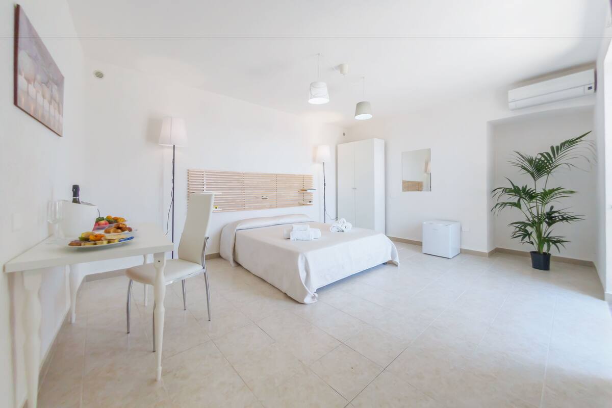 Superior Quadruple Room, Sea View | Premium bedding, minibar, desk